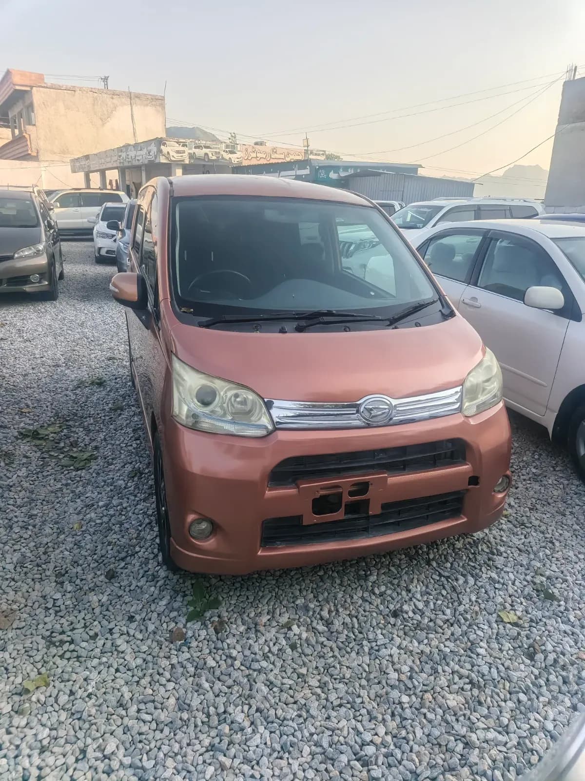 Daihatsu Move 2013 — photo 1